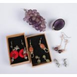 A collection of jewellery to include two pair of silver earrings, amethyst grapes, etc.