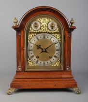 An early 20th century mahogany dome top bracket clock by Winterhalder & Hofmeier. Having brass