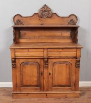 A Victorian pine chiffonier, with cupboard door base and carved scrolled detailing. Height: 145cm,