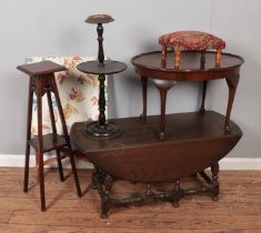 A quantity of furniture including drop leaf coffee table, occasional tables, footstool etc