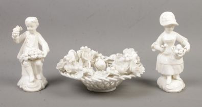 A King Street Derby white glazed encrusted flower basket along with a pair of similar figures.