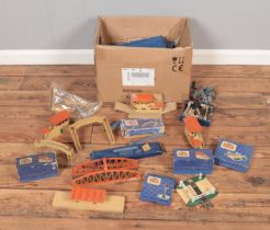 A quantity of boxed and unboxed Hornby Dublo sets including DI Footbridge, DI Signal Cabin, DI