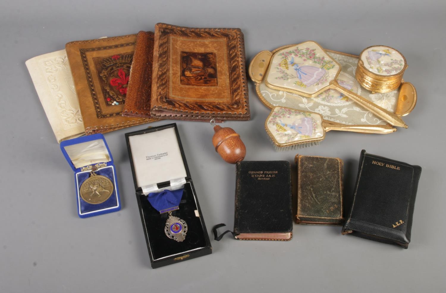 An assortment of collectables to include cased silver Newsagents medal, mother of pearl backed
