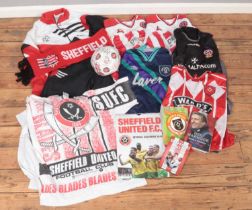 A collection of Sheffield football shirts and other memorabilia including a football signed by