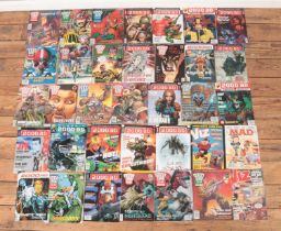 A box containing a large quantity of comics and magazines. To include 2000AD, Viz, Marvel Heroes and