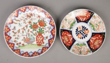 Two large late 19th/early 20th century Imari chargers. Largest diameter 37cm.