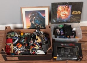 Two boxes of toys and diecast vehicles along with two Star Wars posters. Includes boxed Maisto