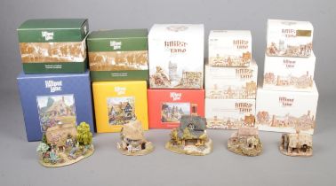 A collection of boxed Lilliput Lane cottages to include Cathedral Bells, The Cat's Whiskers,