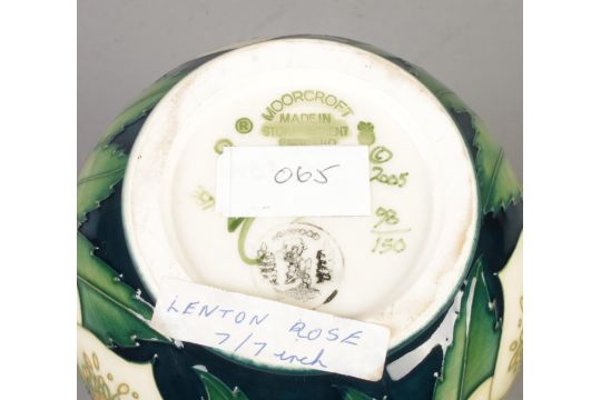 A Moorcroft pottery vase decorated in the Lenton Rose pattern by Emma Bossons. Date cypher for 2005. - Image 2 of 2