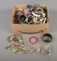 A good collection of assorted costume jewellery to include bracelets, necklaces, bangles,