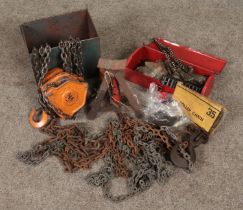 A quantity of assorted tools. Includes pulley and chain, jack, roller chains etc.