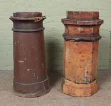Two chimney pots, including octagonal shaped example. Tallest: 75cm. Two chips to cylindrical