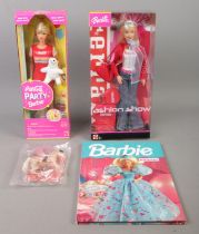 A collection of boxed Barbie figures and accessories, produced by Mattel, Matchbox and Marvel. To