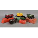 A collection of mostly boxed Hornby Meccano O Gauge tinplate model trains. Includes Type 30