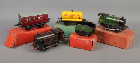 A collection of mostly boxed Hornby Meccano O Gauge tinplate model trains. Includes Type 30