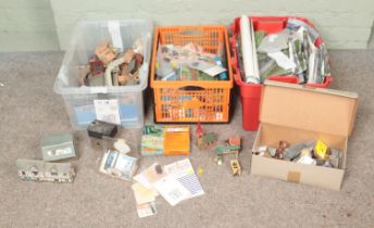 Three boxes of assorted model railway building accessories to include large quantity of backgrounds,