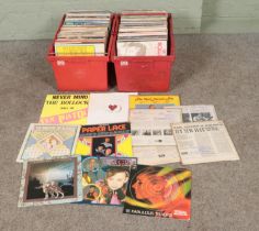 Two boxes of assorted vinyl records of mostly pop and listening to include The Sex Pistols,