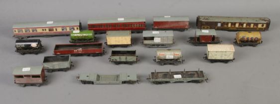 A small collection of Hornby Dublo tin plate OO gauge rolling stock. To include carriages, wagons,