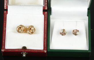 Two pairs of 9ct gold knot earrings. Includes tri colour example. 3.19g.