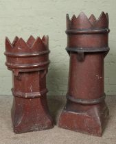Two stoneware chimney pots with crown tops, one of tapering from, both on square bases. Tallest
