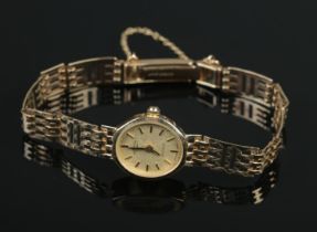 A ladies 9ct gold Rotary quartz wristwatch with 9ct gold bracelet strap. Gross weight 12.62g.