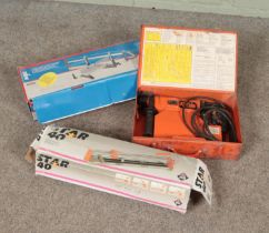 Three boxed tools. Includes Mejix precision mitre handsaw, Spit 325 drill and a Rubi Star 40 ceramic