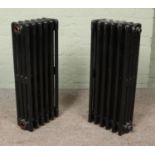 Two painted six-bar cast iron radiators. Height: 75cm.