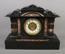 A large Victorian slate and marble mantel clock