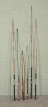 A quantity of fishing rods. Includes Weiss example.