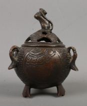 A Chinese bronze censor with mouse finial on cover