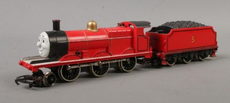 An unboxed Hornby 00 Gauge Thomas and Friends, James the Red Engine.