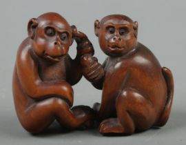 Two Japanese carved Netsuke in the form of Monkeys