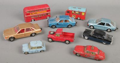 A quantity of vintage Corgi diecast vehicles. Includes Smith's Karrier Van, Morris Mini-Minor,