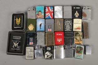 A collection of assorted lighters to include Zippo, Ronson, Dora, Rolstar, Calibri, etc.