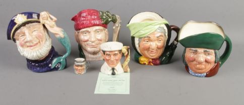 A collection of mostly large Royal Doulton character jugs to include Dickie Bird MBE (D7068), Toby