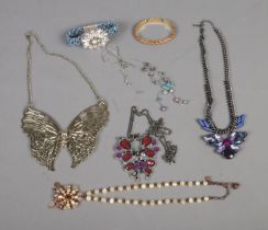 A small collection of assorted costume jewellery to include Bibi Bijoux bangle, large butterfly