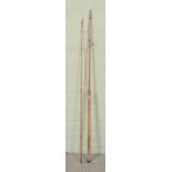 A vintage Lindop split cane two piece fishing rod.