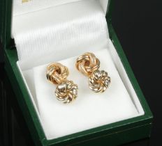 Two pairs of 9ct gold knot earrings. 2.83g.