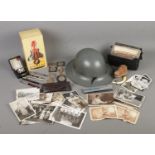 A quantity of collectables. Includes WWII Zuckerman Civil Defence helmet, coins, postcards, silver