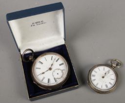 Two silver pocket watches.