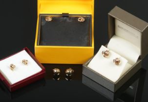 Four pairs of 9ct gold earrings. Includes three knot examples. 3.18g.