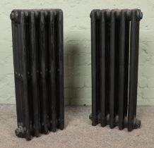 Two painted five-bar cast iron radiators. Height: 73cm.
