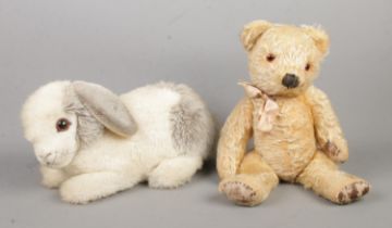 A Steiff rabbit, with button in ear labelled 2995/30, together with a vintage joined teddy bear.