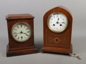 A mahogany inlaid mantel clock together with another oak example