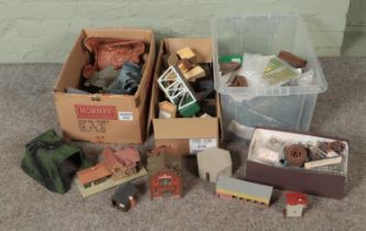 Three boxes of assorted model railway scenery and diorama building supplies to include Faller,