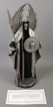 An applied metal sculpture by Michael Browne formed as the Grim Reaper. (46cm)