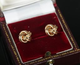 A pair of 9ct knot earrings. 2.62g.