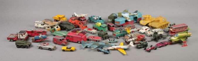 A collection of vintage play worn diecast vehicles, to include Corgi, Dinky and Matchbox examples.