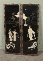 Two Asian carved mother of pearl and lacquer wall panels.