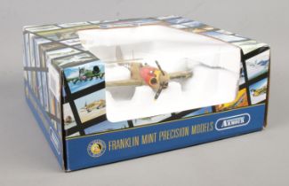 A Franklin Mint Precision Model aircraft from the Armour Collection; Curtiss P-40N Warhawk '